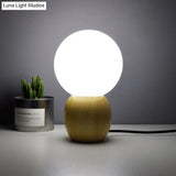 Contemporary White Glass Spherical Task Light: 1-Bulb Reading Book Light In Wood