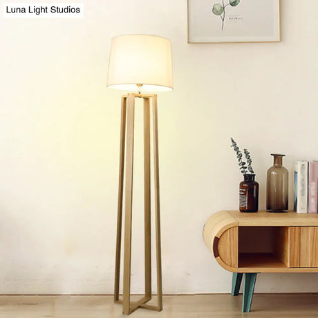 Contemporary Wood Trapezoid Floor Lamp With White Barrel Fabric Shade