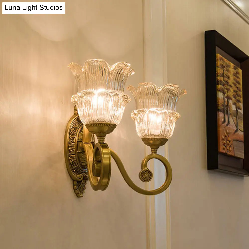 Country-Style Brass Wall Sconce With Crystal Glass Flower Accent And Swooping Arm - 1/2 Bulb Light