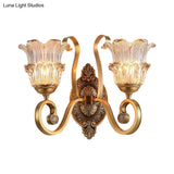 Country-Style Brass Wall Sconce With Crystal Glass Flower Accent And Swooping Arm - 1/2 Bulb Light