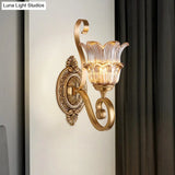 Country-Style Brass Wall Sconce With Crystal Glass Flower Accent And Swooping Arm - 1/2 Bulb Light