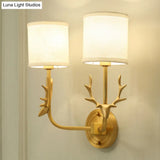 Country Style Gold Deer Wall Mounted Light With Dual Metal Heads And Cylinder Fabric Shade