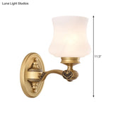 Country Urn Milky Glass Wall Sconce With Brass Finish Bedroom Lighting Idea