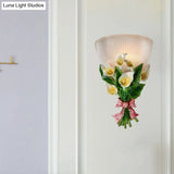 Dome Shaped Modern Wall Lamp With Ribbed Glass White Sconce Lighting And Green Bouquet Detail