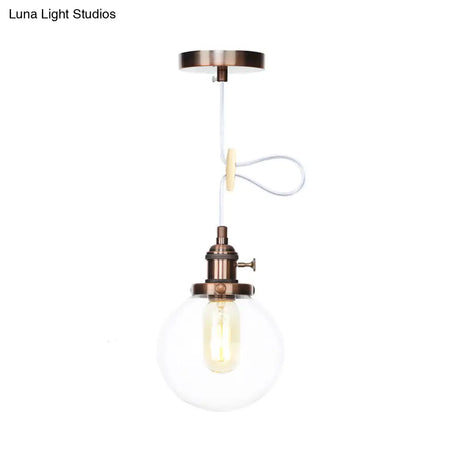 Farmhouse Orbit Pendant Light With Amber/Clear Glass And Adjustable Cord In 3 Elegant Finish Options