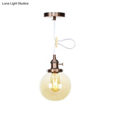 Farmhouse Orbit Pendant Light With Amber/Clear Glass And Adjustable Cord In 3 Elegant Finish Options