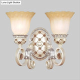 French Country Blossom Wall Sconce - Opaline Glass Lighting With Swirl Arm In Gold