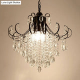 Glam Teardrop Pendant Light With Metal Curved Arm And Cascading Crystal Strands
