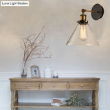 Gold Arm Wall Sconce With Glass Shade For Indoor Bar Décor