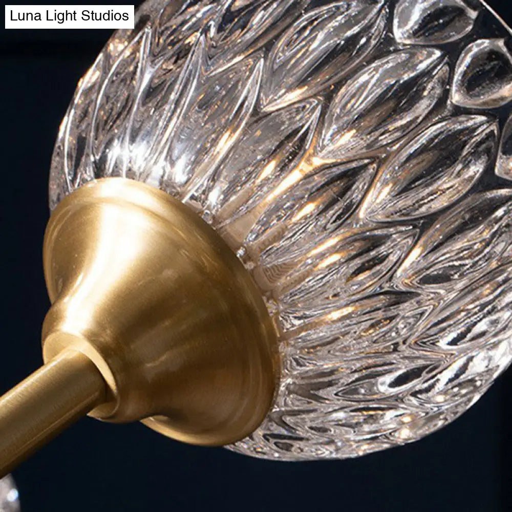 Gold Finish Chandelier With Metallic Branch Design And Clear Crystal Shade