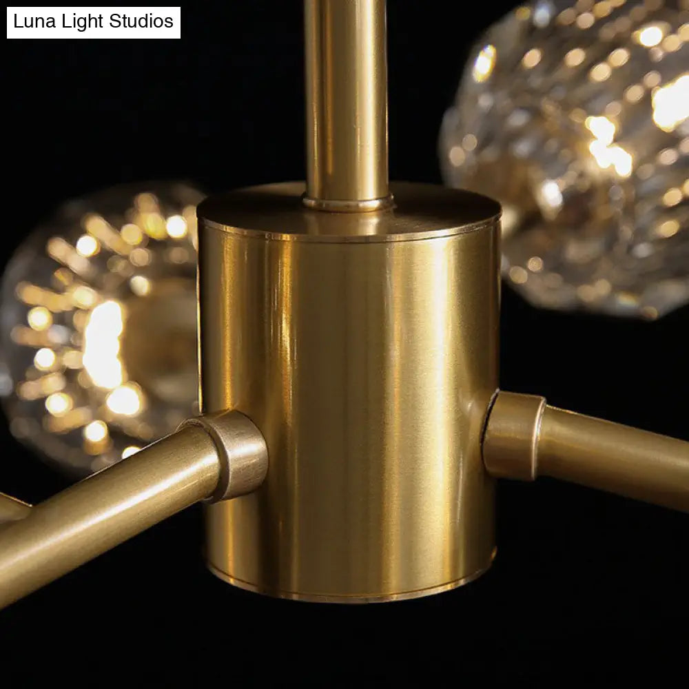 Gold Finish Chandelier With Metallic Branch Design And Clear Crystal Shade