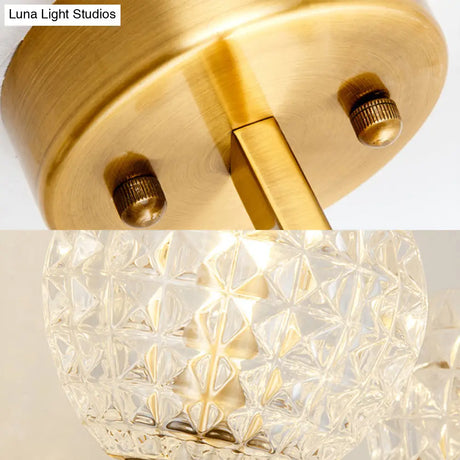 Golden Clean-Lined 1-Light Wall Lamp With Clear Grid Glass Shade For Elegant Hallways