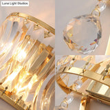 Golden Curved Metal Wall Sconce With Clear Crystal Prism