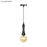 Industrial Black Finish Amber Glass Pendant Lamp With Pipe Suspension - 1-Light Ball/Capsule