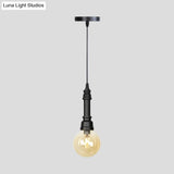 Industrial Black Finish Amber Glass Pendant Lamp With Pipe Suspension - 1-Light Ball/Capsule
