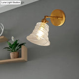 Industrial Brass Wall Sconce Lamp - Flared Clear Swirl Glass Bedroom Lighting