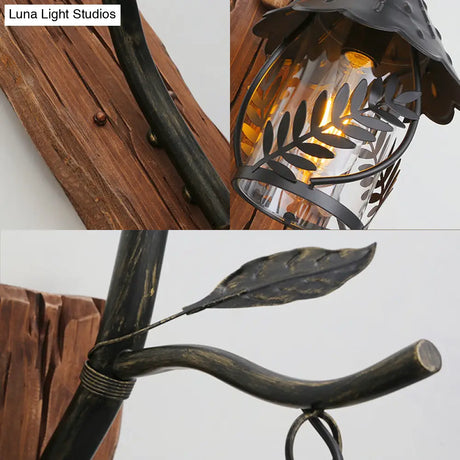 Industrial Clear Glass/Fabric Black Sconce Light With 1-Light Cylinder Leaf And Wood Backplate