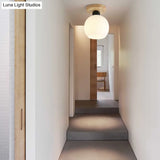 Industrial Globe/Cylinder Frosted Glass Semi Flush Mount Light In Black For Foyer - Single Bulb