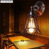 Industrial Iron Cage Rotatable Bronze Sconce Lamp - Floral Wall Mount Light For Bar