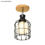 Industrial Loft Ceiling Fixture With Wire Cage And Rotatable Bulb - Black Metallic Semi-Flush Mount