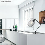 Industrial Style Metal Cylindrical Table Light With Adjustable Black/Brass Finish And Mesh Screen