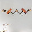 Industrial Style Wall Sconce With 5 Open Bulb Lights And Book Shelf Design In Black Metal
