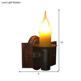 Industrial Wall Sconce With Clear Glass And Bronze Finish - 1-Light Candle Mount