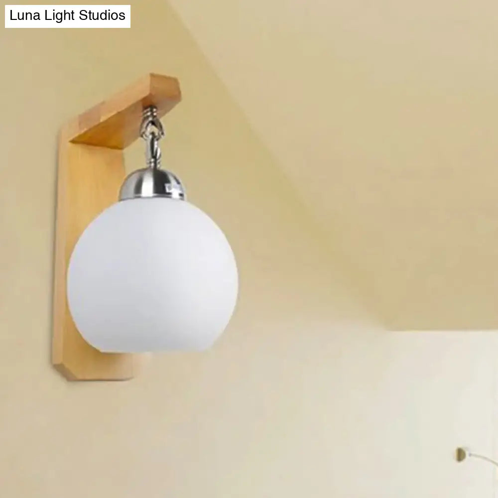Industrial Wall Sconce With Opal Glass Globe Shade And Wood Backplate - Bedroom Lighting Fixture