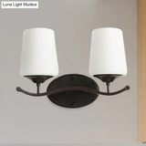 Ivory Glass Vanity Lighting With Iron Wavy Arm - Traditional Black Tapered Wall Light For Bedroom