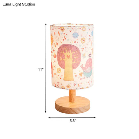 Kids Wood Cylinder Nightstand Lamp With Tree And Flower Pattern - Fabric Shade