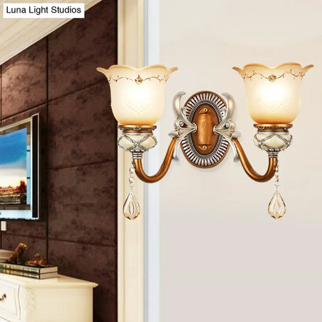 Lodge Style Flower Wall Lamp With Frosted Glass Teardrop Crystal Deco And Metal Arm In Gold -