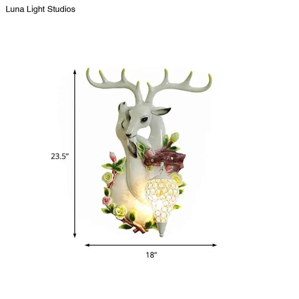 Loft Style Wall Mounted Sconce With Clear Crystal Shade Blue/Gold Finish And Deer Head Accent