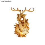 Loft Style Wall Mounted Sconce With Clear Crystal Shade Blue/Gold Finish And Deer Head Accent