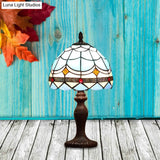 Mediterranean 1-Light Stained Glass Table Lamp With Wave-Pattern Dark Brown Nightstand Light