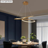 Metal Led Chandelier: Sleek Seamless Curves For Minimalistic Dining Room Lighting