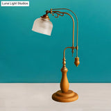 Metallic Curvy Table Lamp With Antique Style In Red Brown/Yellow Brown/Wood Finish And Clear Glass