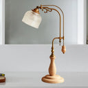 Metallic Curvy Table Lamp With Antique Style In Red Brown/Yellow Brown/Wood Finish And Clear Glass