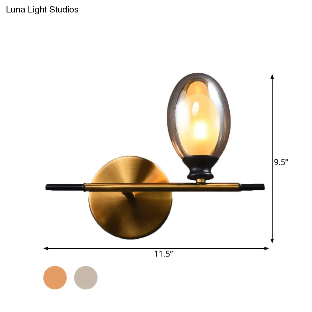 Mid Century Brass Wall Lamp With Dual Oval Clear/Amber Glass Shade