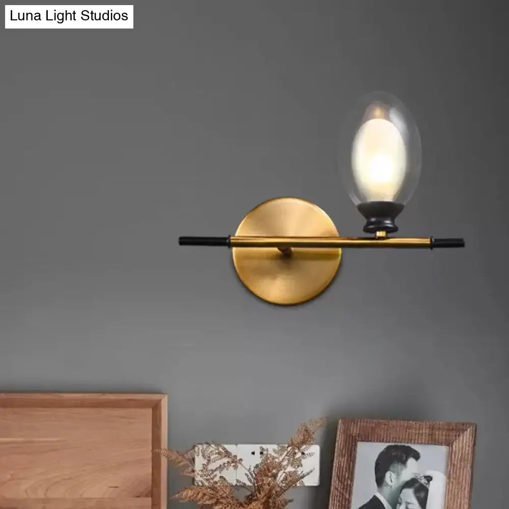 Mid Century Brass Wall Lamp With Dual Oval Clear/Amber Glass Shade