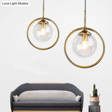 Mid-Century Globe Hanging Lamp With Glass Shade & Metal Ring - Perfect For Bedrooms
