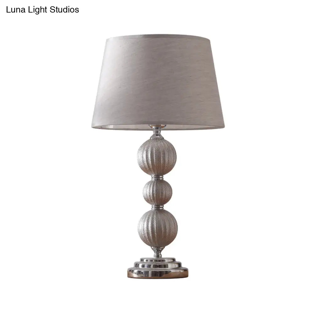 Minimal Silver Bedside Lamp With Ceramic Base And Fabric Shade