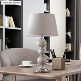 Minimal Silver Bedside Lamp With Ceramic Base And Fabric Shade