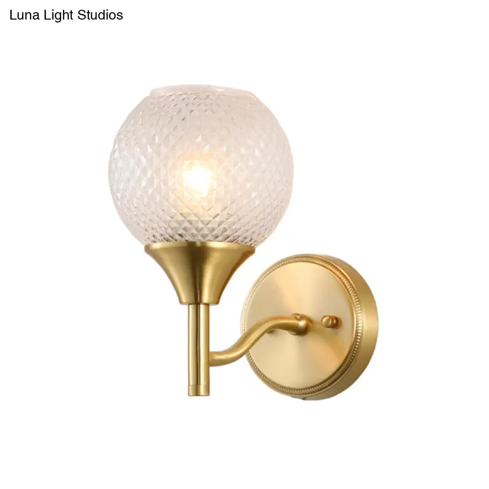 Minimal Single Light Brass Wall Sconce With Spherical Prismatic Glass
