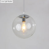 Sleek 1-Head Restaurant Pendant Lamp With Glass Sphere Shade Clear / 12