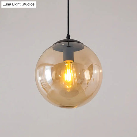 Sleek 1-Head Restaurant Pendant Lamp With Glass Sphere Shade Amber / 5