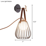 Minimalist Black Led Wall Sconce With Leather Handle - Pear Cage Iron Design