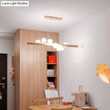 Minimalist Cream Glass Led Pendant Light For Restaurants - Ball Island Ceiling With Wood Accent