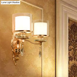 Minimalist Cylinder Wall Sconce With Crystal Accent And Gold Finish