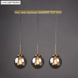 Minimalist Glass Globe Hanging Ceiling Pendant Light Set Of 3 For Restaurants