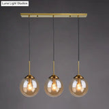 Minimalist Glass Globe Hanging Ceiling Pendant Light Set Of 3 For Restaurants